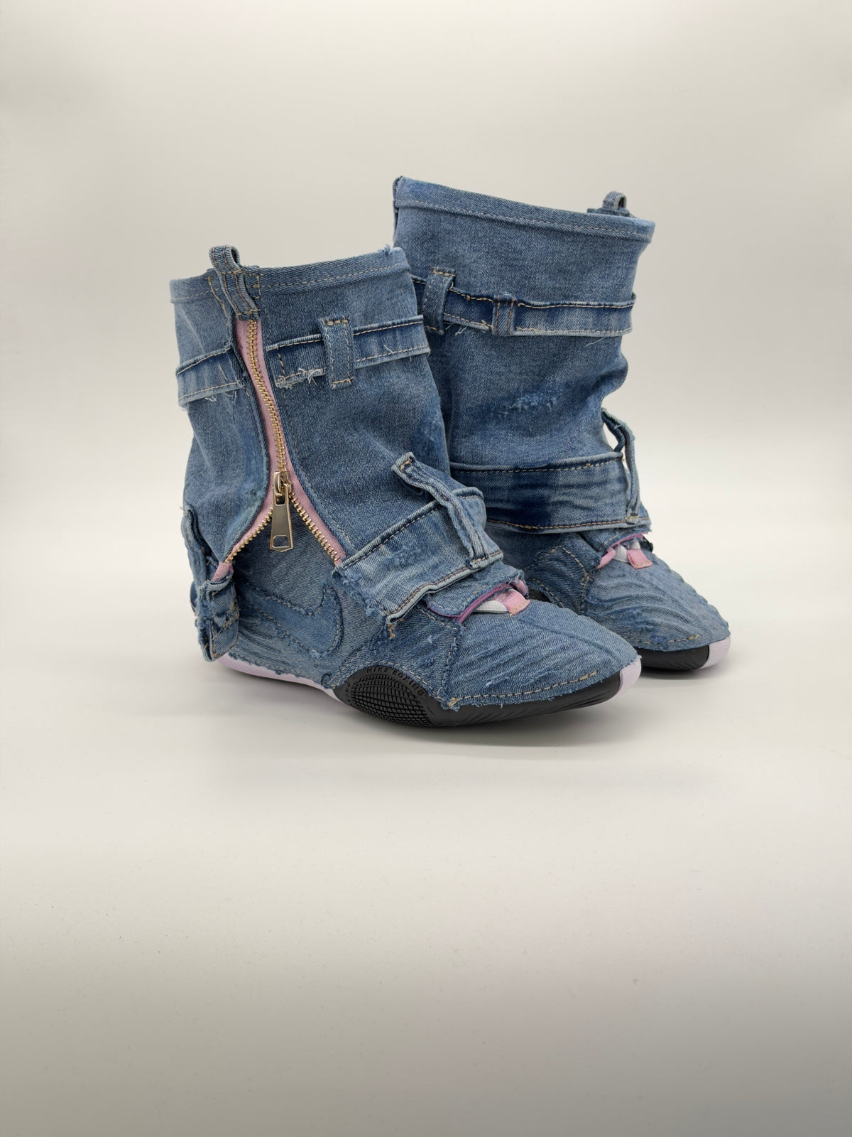 Reconstructed denim HyperKO 3 boxing boots with pink zip detail, side view