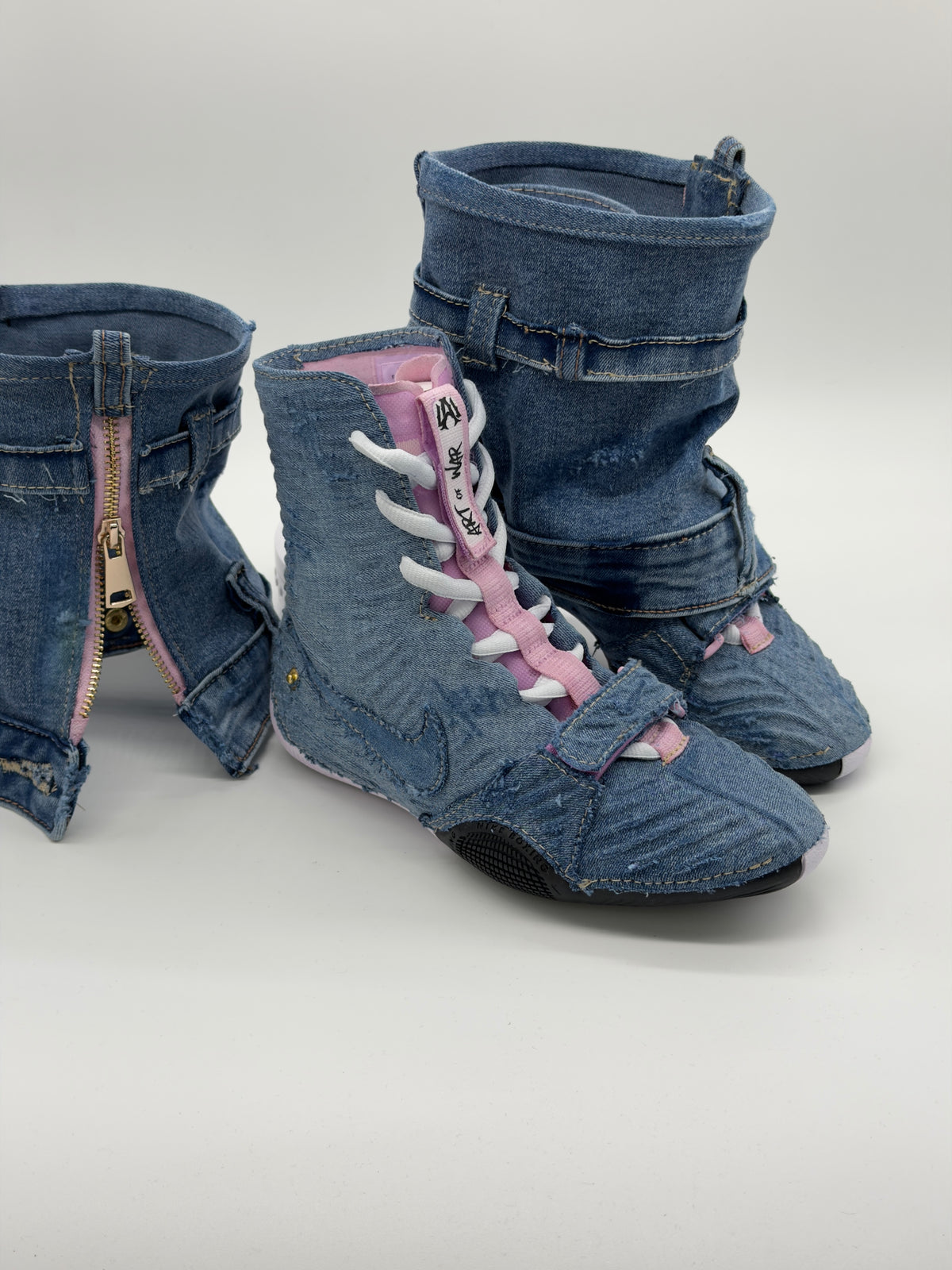 Pair of hand-reconstructed denim HyperKO 3 boxing boots with pink lining and white laces